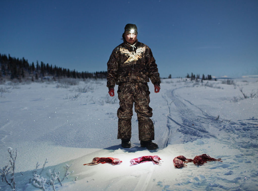 Hunter with Arctic Hare